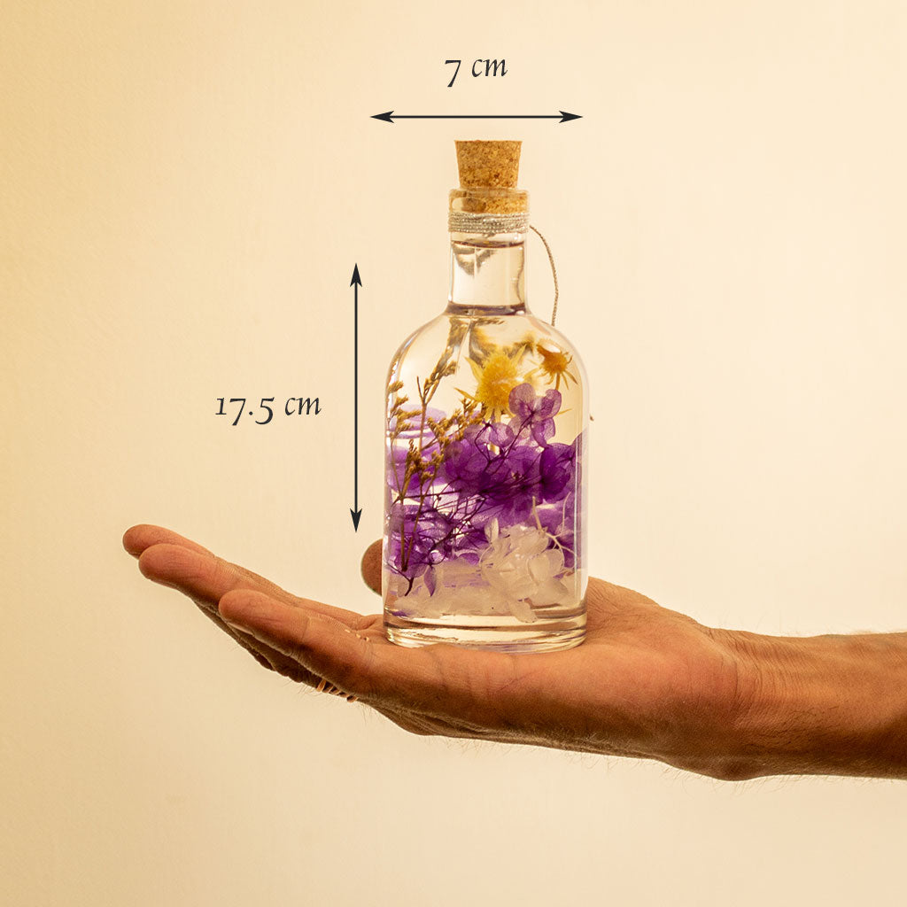 Precious Purple Preserved Flower Tabletop shown in hand – elegant royal-tone preserved décor.