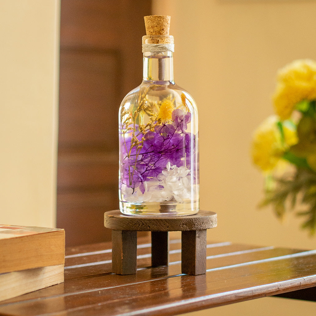 Precious Purple Preserved Flower Tabletop on circular stand – luxurious purple décor centerpiece.