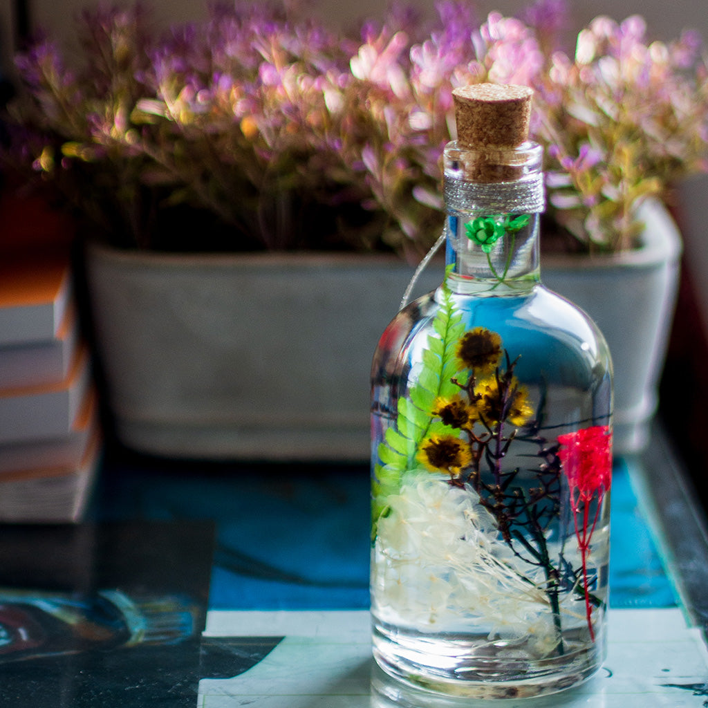 A warm and cheerful preserved arrangement that brightens interior moods.