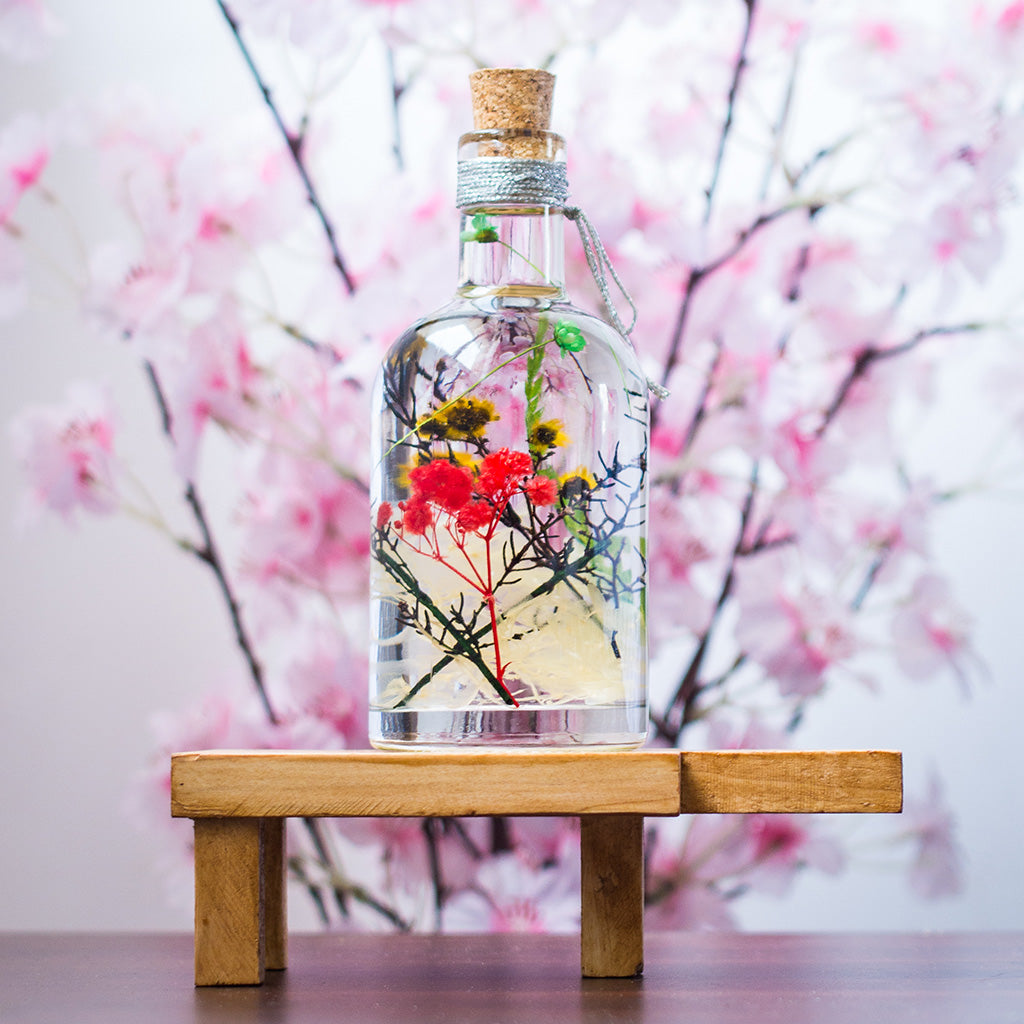 Touch of Sun Preserved Flower Tabletop on rectangular stand – warm sunny preserved display.