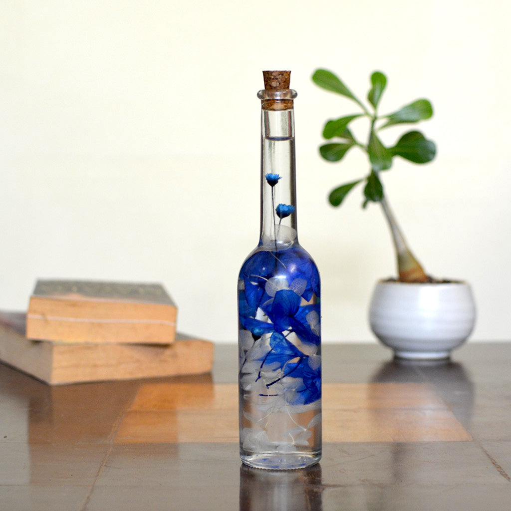 Unfurled Camo Preserved Flower Tabletop on table – woodland décor accent.