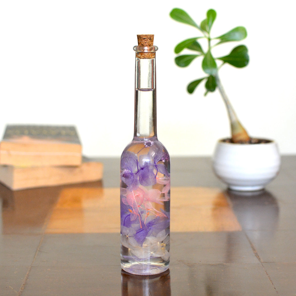 Winsome Strew Preserved Flower Tabletop placed on table – charming floral accent.