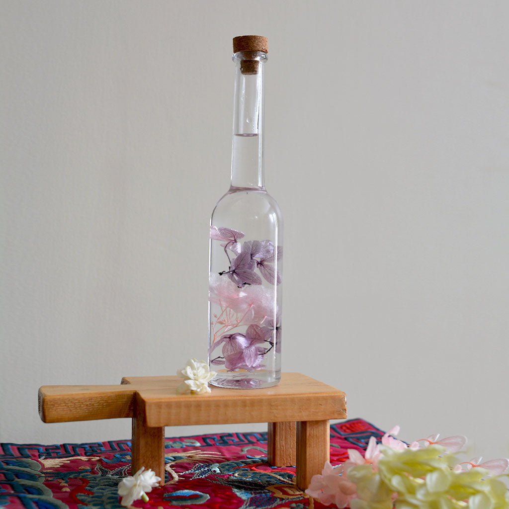 Winsome Strew Preserved Flower Tabletop on rectangular stand – joyful display piece.