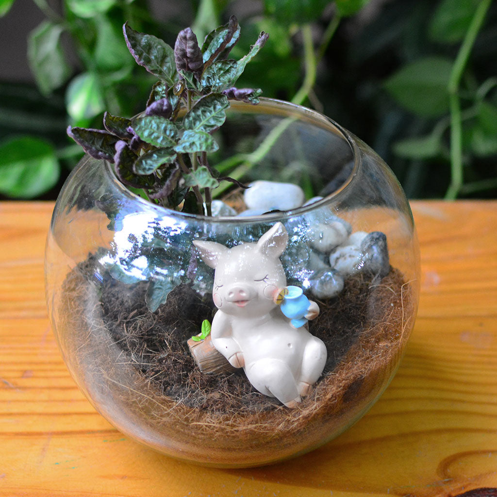 Resin pig lounging figure