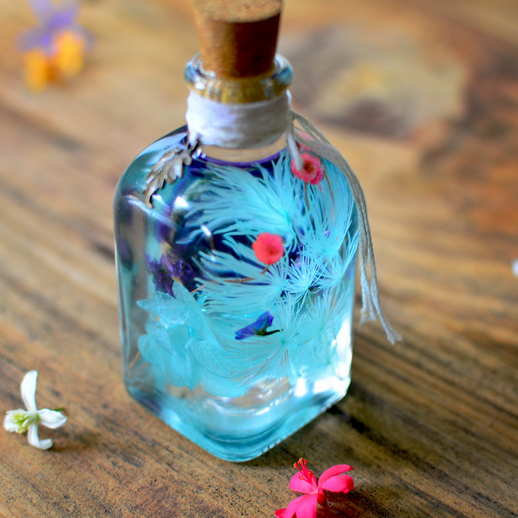 Sapphire Symphony Preserved Flower Tabletop placed on table – cool, refreshing centerpiece.