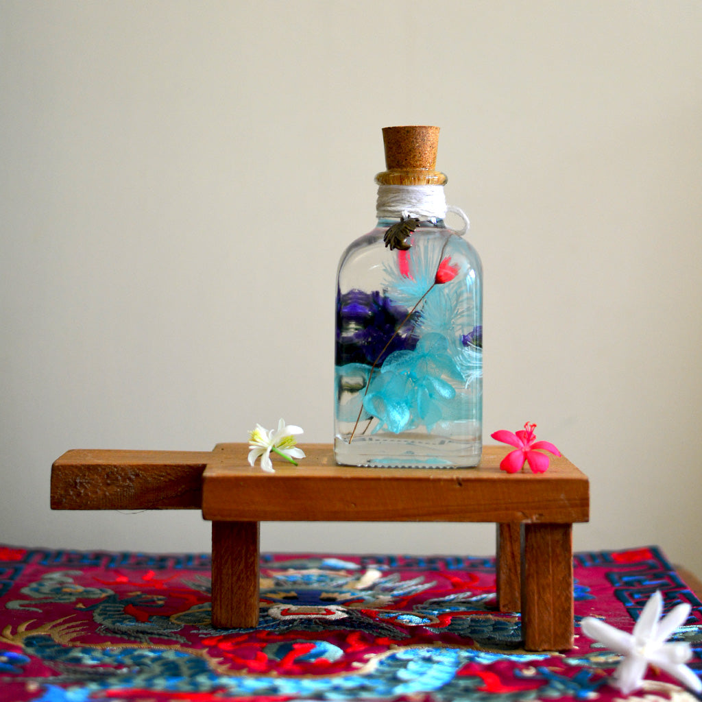 Sapphire Symphony Preserved Flower Tabletop on rectangular stand – crisp preserved display.