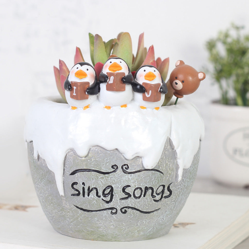 penguin succulent planter Singing Penguins Succulent Pot – Cute Resin Planter