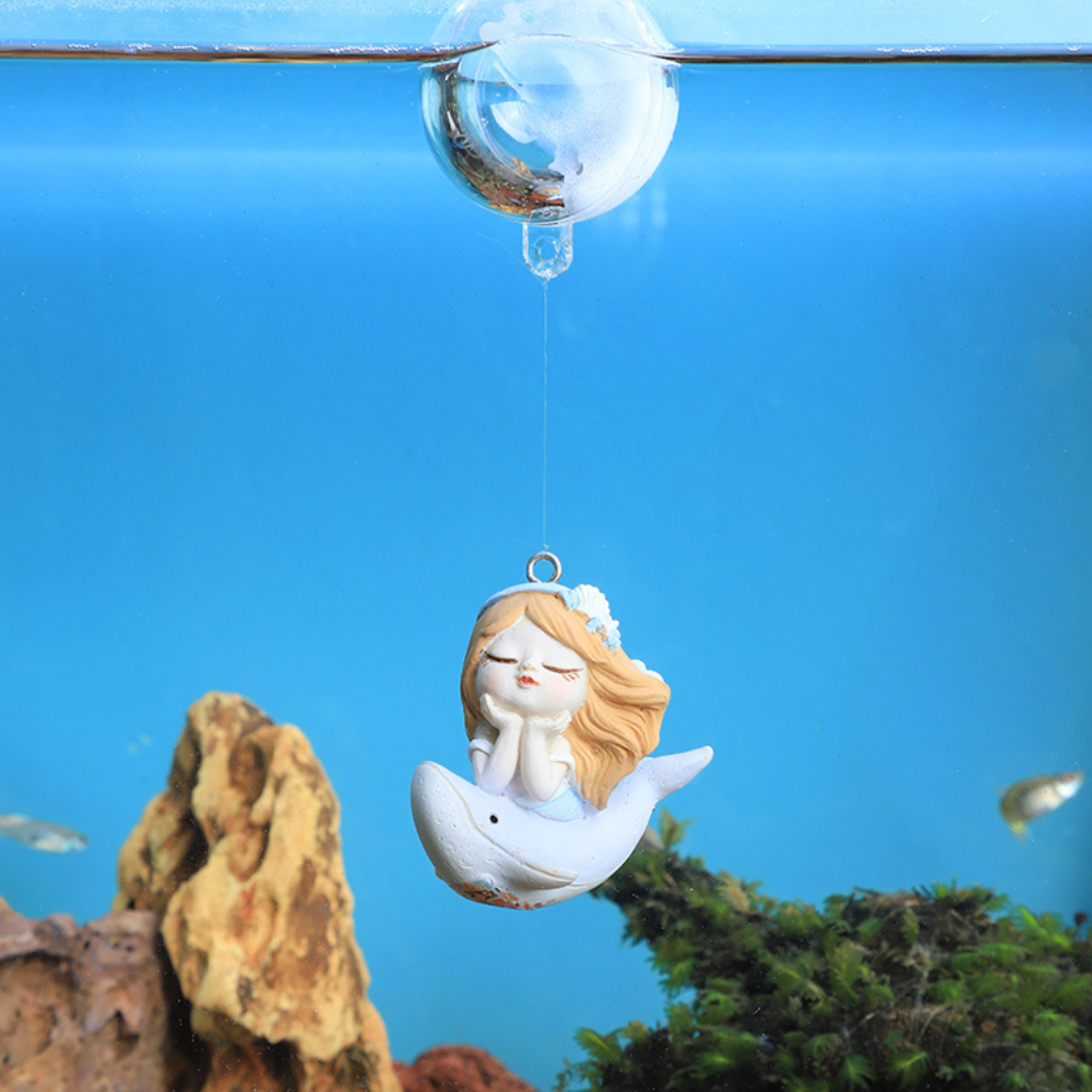 Miniature Baby Girl Sitting on Dolphin Decor