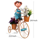 Boy on Bicycle With 2 Pots