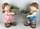 Boy & Girl standing with Pot Planter